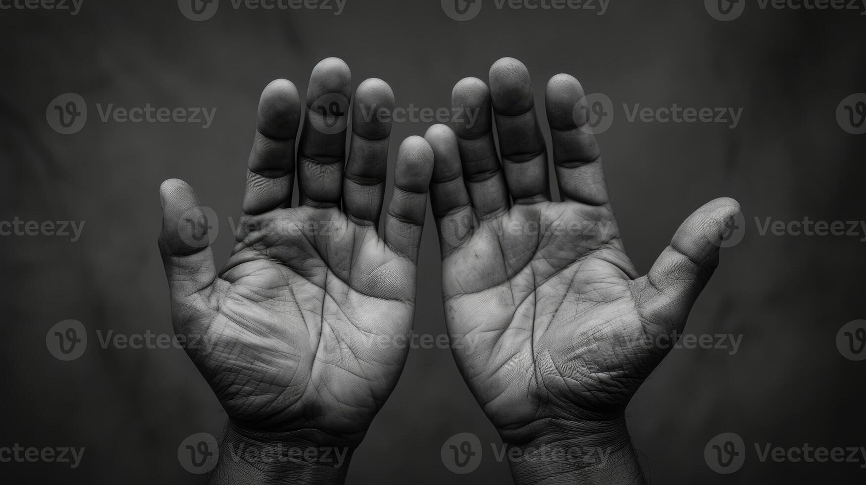 A pair of hands held up in surrender a powerful image of the powerlessness and vulnerability of those facing political oppression photo