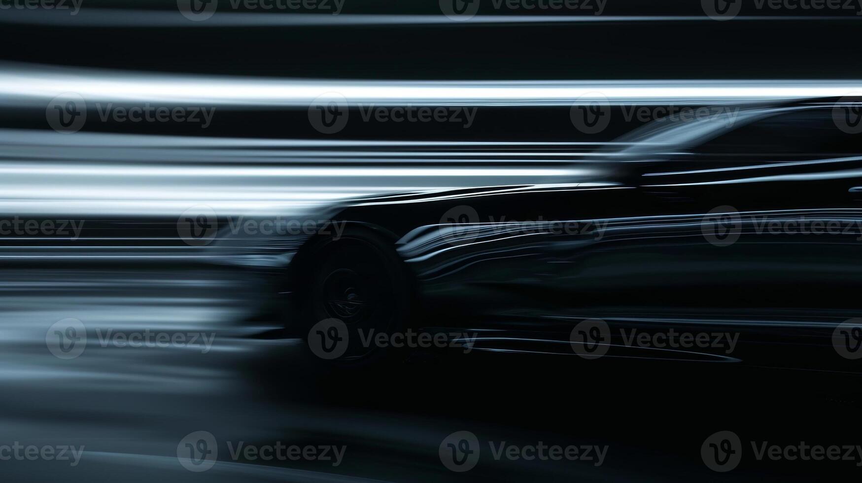 A closeup shot of a speeding vehicle its body blurred by the fast movement leaving only the distinct outline of its sleek silhouette photo
