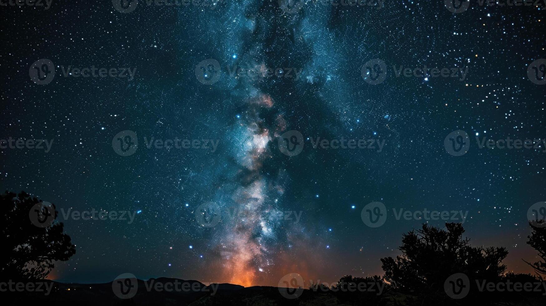 The Milky Way stretching across the night sky, filling the viewer with a sense of the vastness of the universe. photo