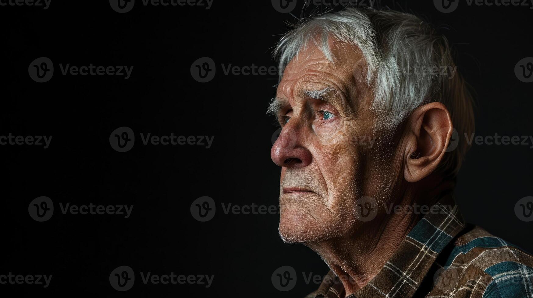 A man in his 50s his face filled with regret and longing as he thinks about the dreams he had for his retirement years that never came to fruition photo