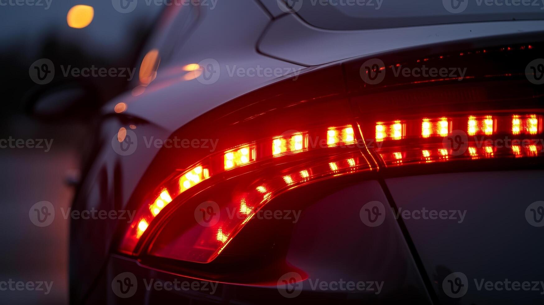 A detailed shot of the LED headlights and taillights on an environmentally conscious car using less energy and lasting longer than traditional lights photo