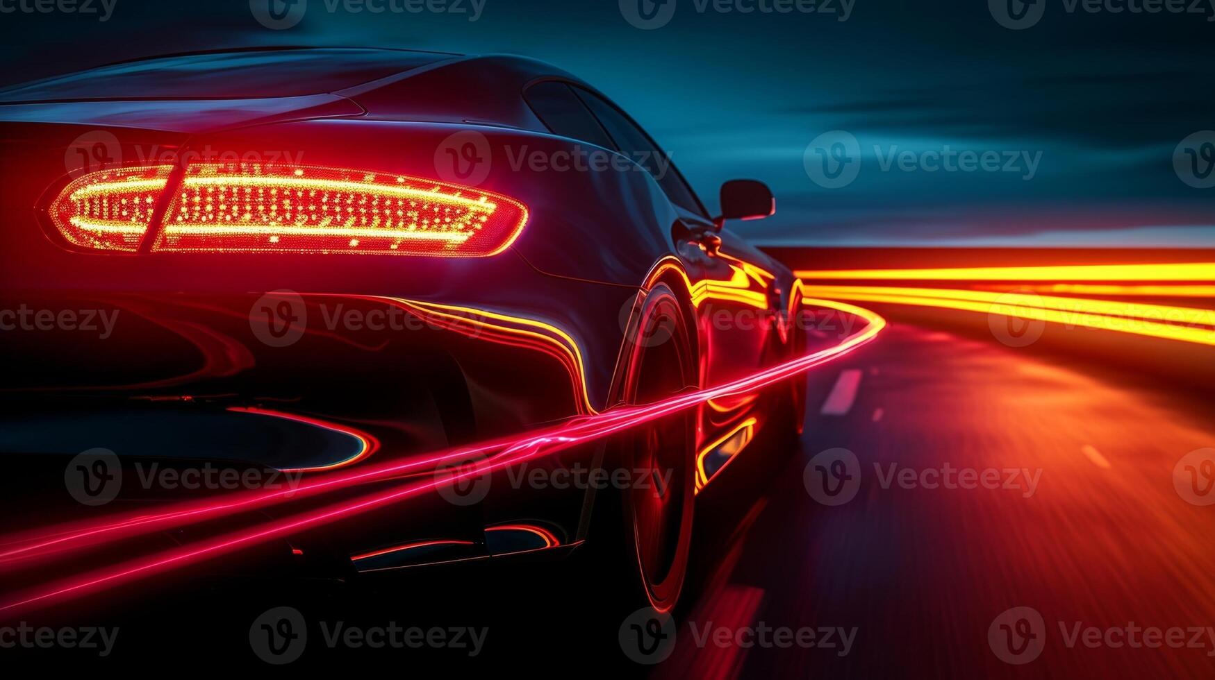 The glowing fiery red tail lights of a car whizzing by illuminate the night air leaving behind a radiant streak in its path photo