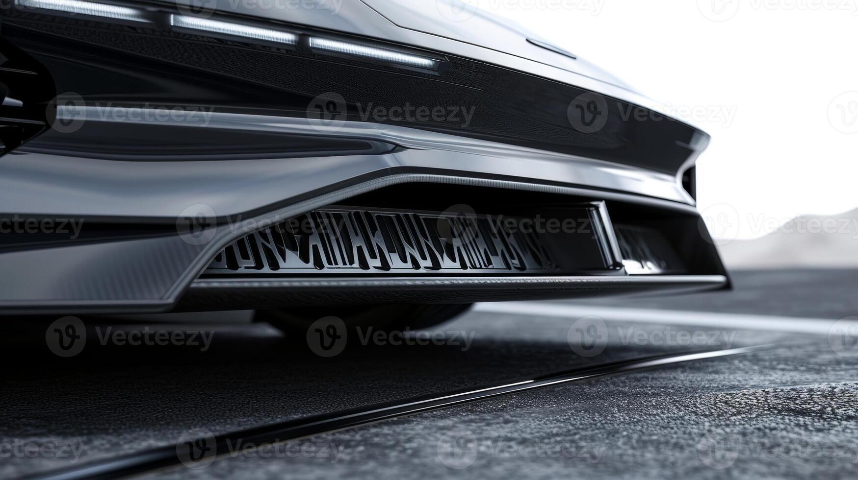 Closeup of the undercarriage of a family car demonstrating the aerodynamic design for improved airflow and reduced drag photo