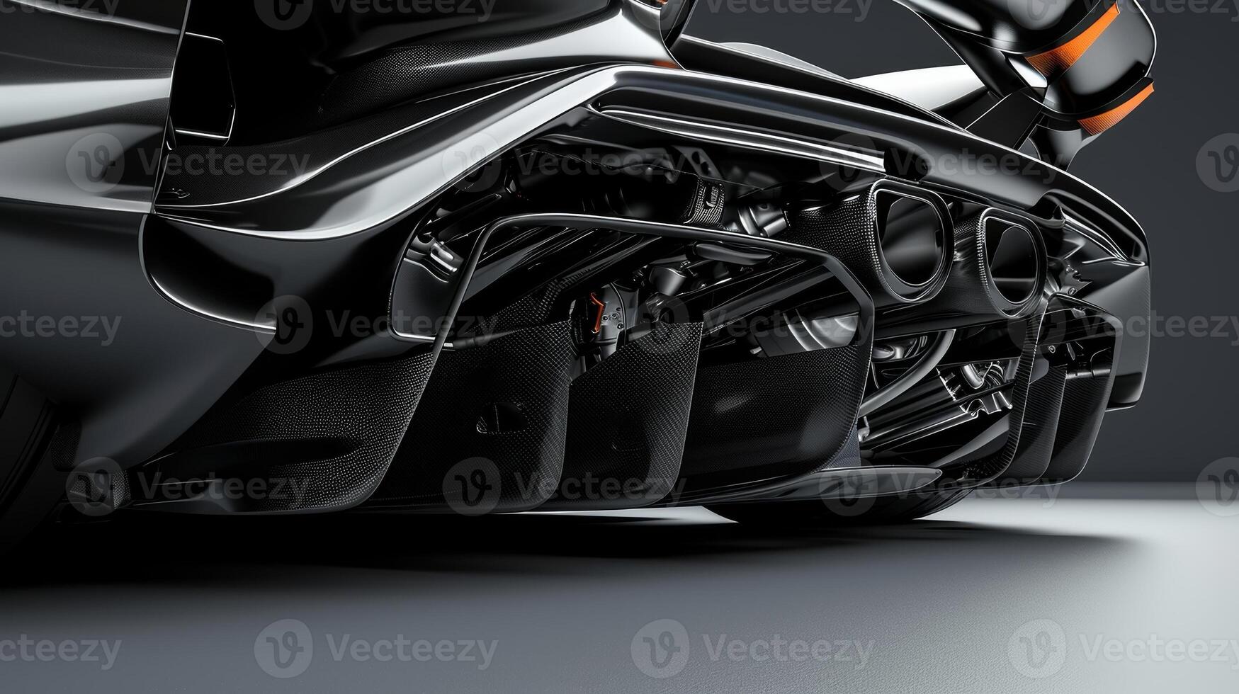 A shot of the cars underbody reveals the smooth and streamlined design featuring air dams and diffusers that help to manage and direct airflow for optimum performance photo