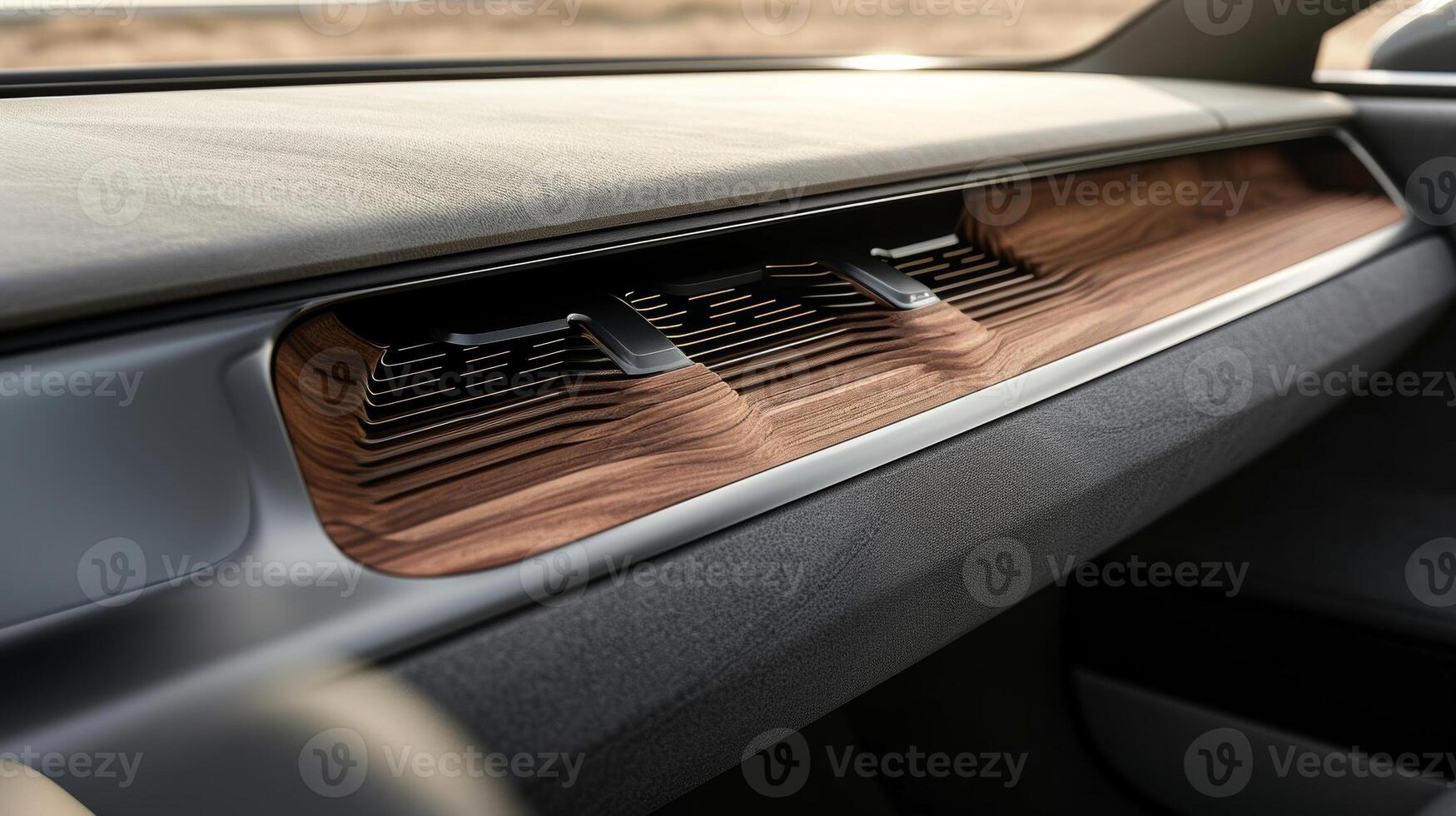 A closeup of the wood trim surrounding the air vents demonstrating the seamless integration of luxury and functionality photo