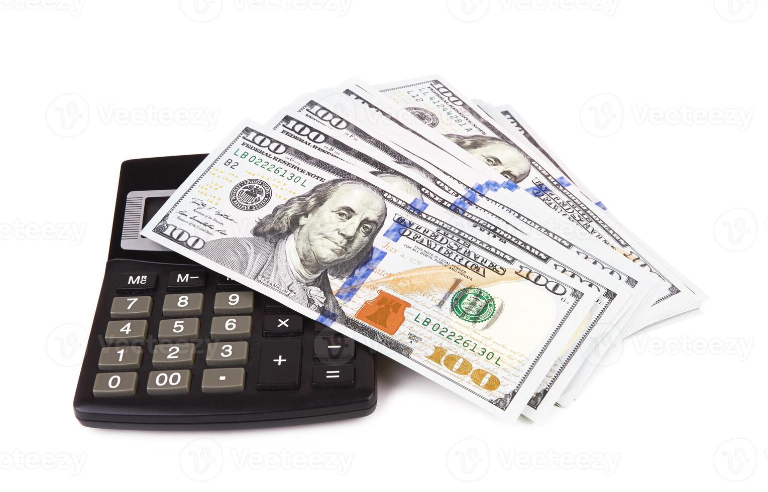 hundred dollars on white photo