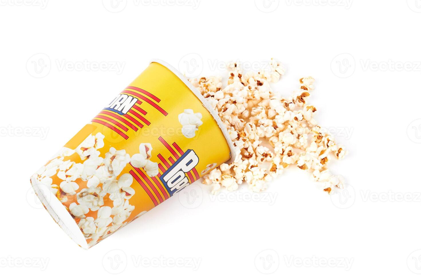 Scattered popcorn from bucket photo