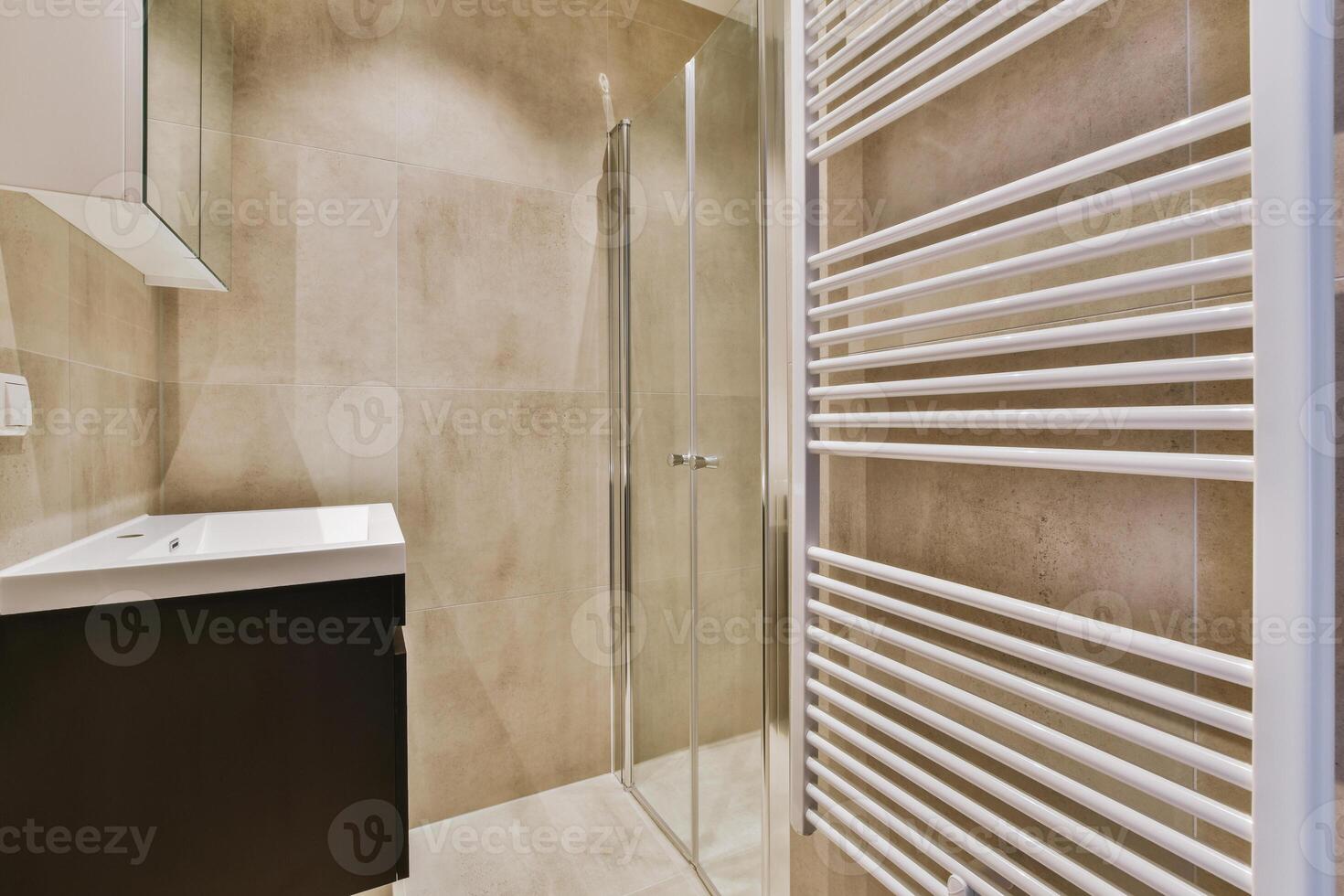 A bathroom with a shower and a sink photo