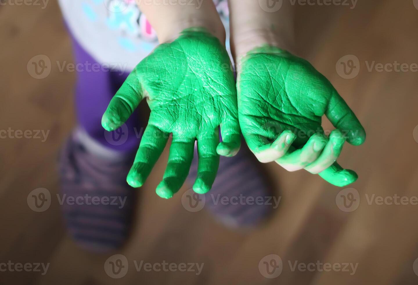 Hands of a child painted watercolor photo