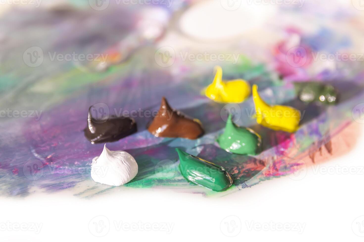 Art palette with oil paints photo