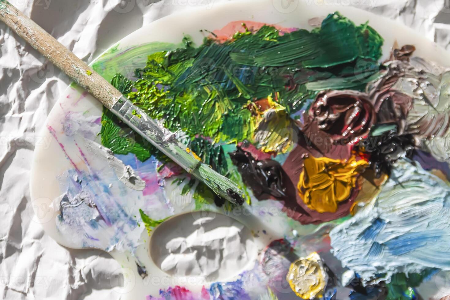 Art palette with oil paints photo