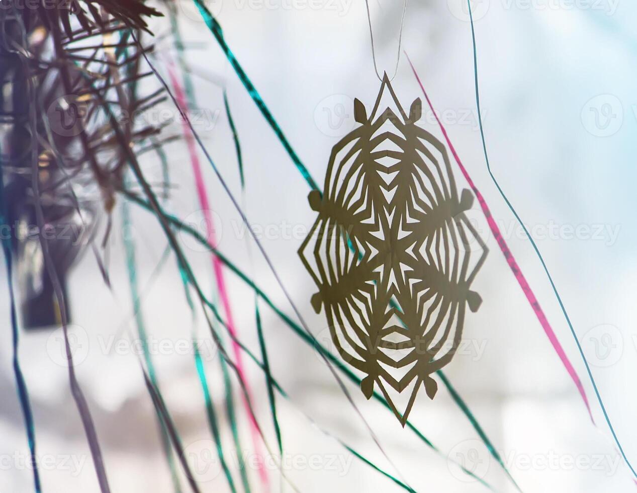 Paper snowflakes in home interior. Christmas and New year decor. photo