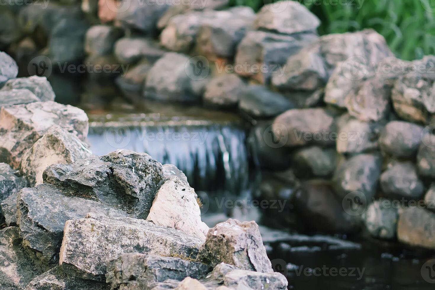 Flowing water on Bastion hill in Riga, Latvia, East Europe photo