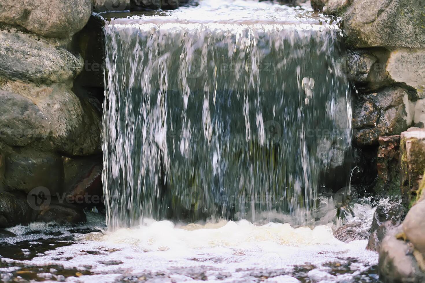 Flowing water on Bastion hill in Riga, Latvia, East Europe photo