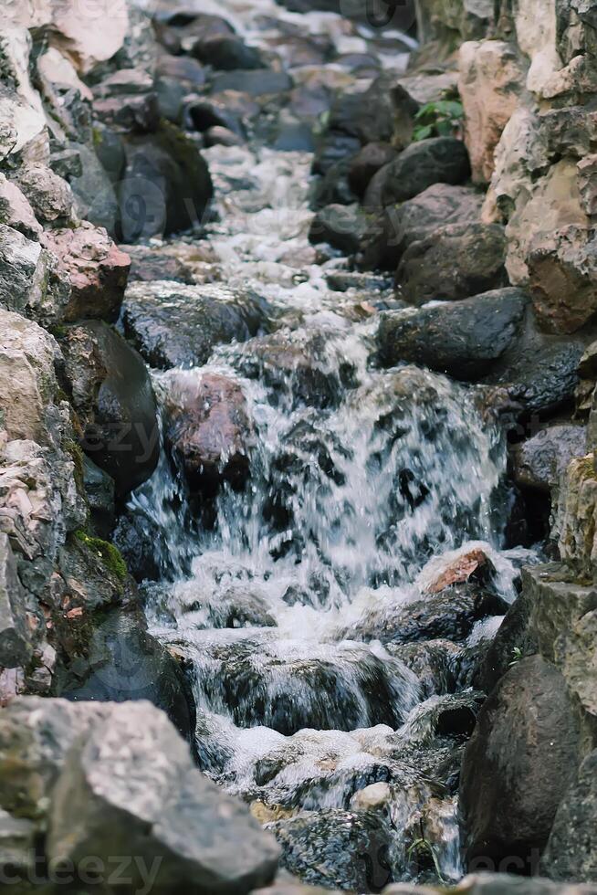 Flowing water on Bastion hill in Riga, Latvia, East Europe photo