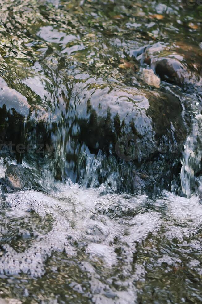 Flowing water on Bastion hill in Riga, Latvia, East Europe photo