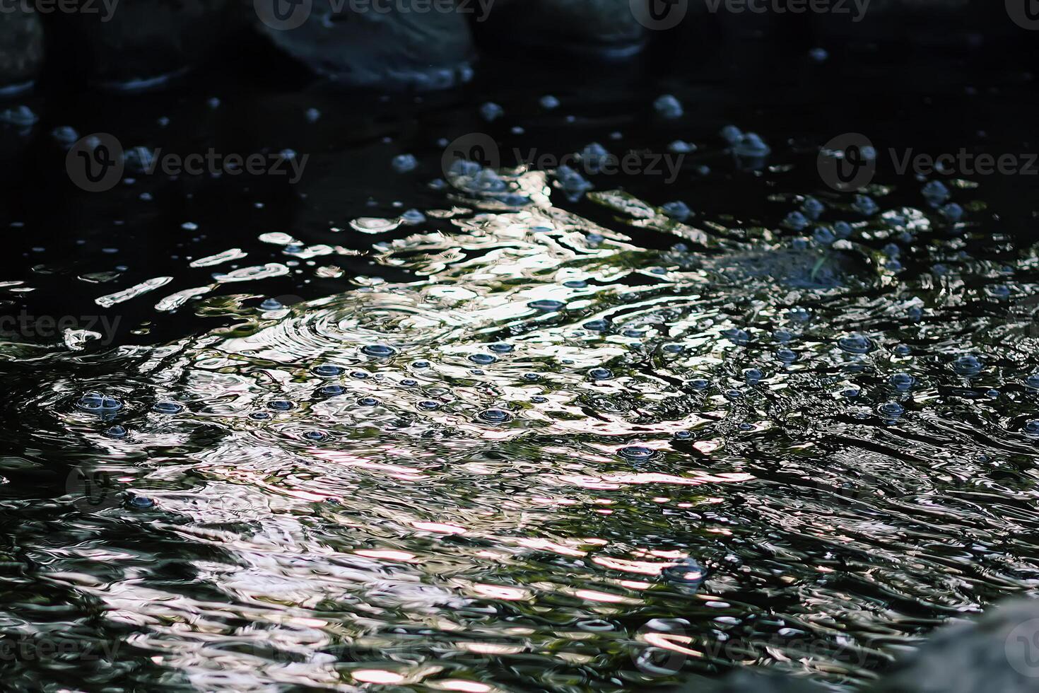 Flowing water on Bastion hill in Riga, Latvia, East Europe photo