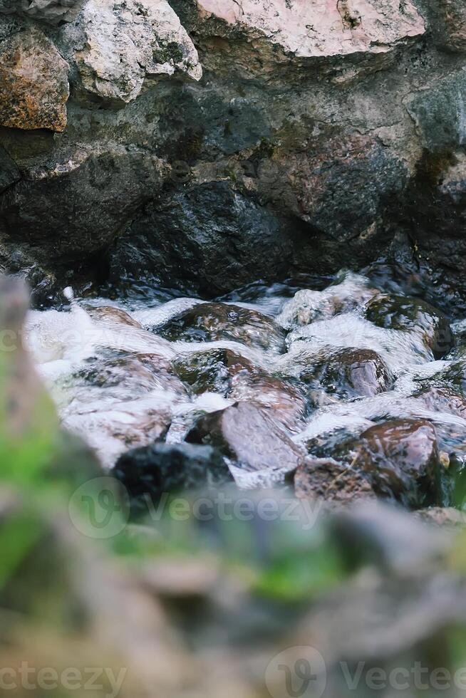 Flowing water on Bastion hill in Riga, Latvia, East Europe photo