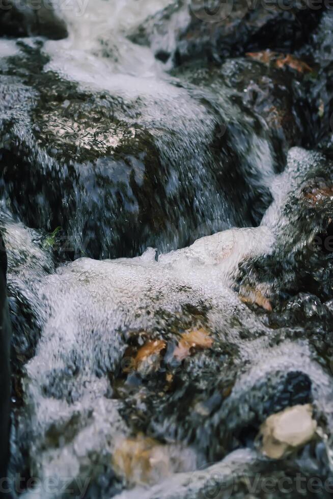 Flowing water on Bastion hill in Riga, Latvia, East Europe photo