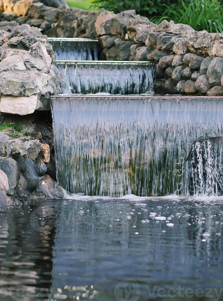 Flowing water on Bastion hill in Riga, Latvia, East Europe photo