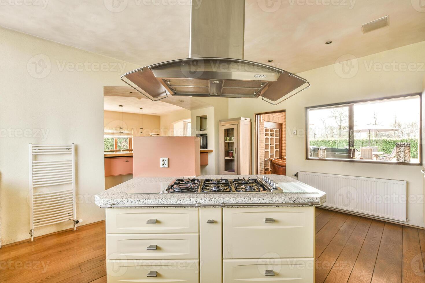 A kitchen with a stove and a sink photo