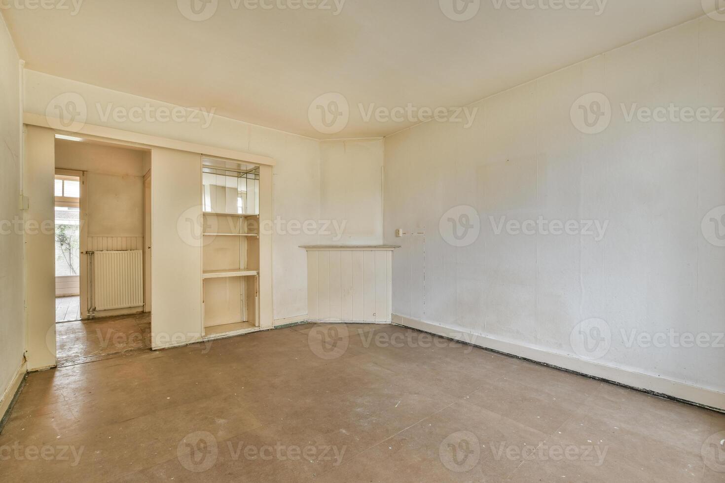 A room with a door and a window in it photo