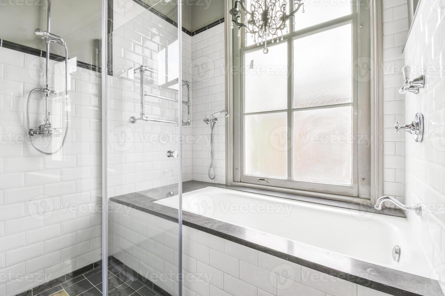 A bathroom with a shower, tub and sink photo