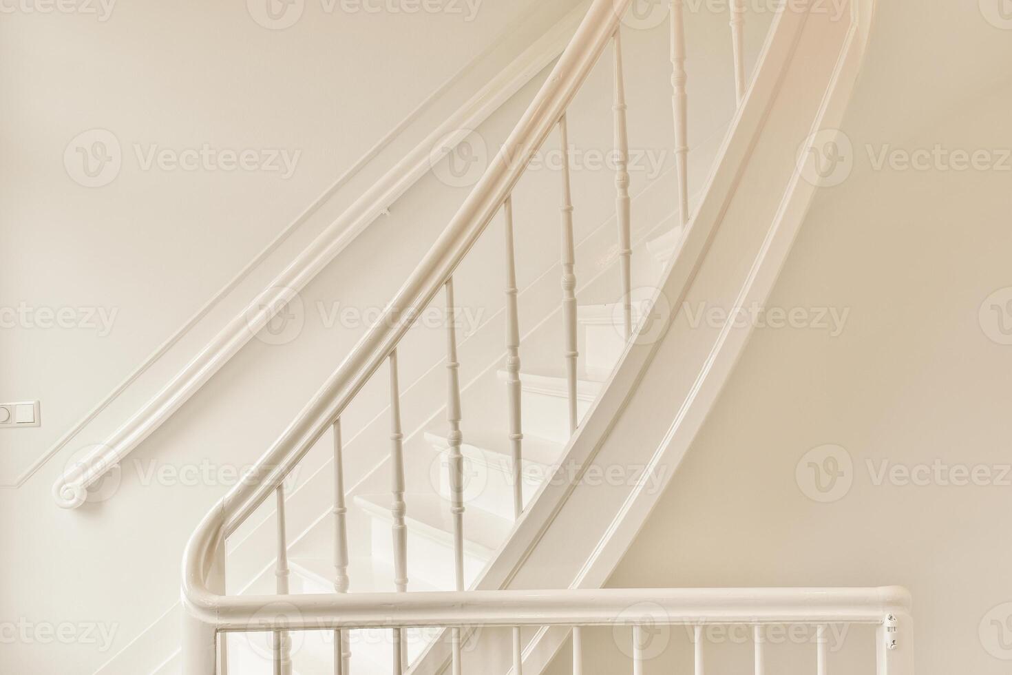 A white stairway with a handrail and a handrail photo