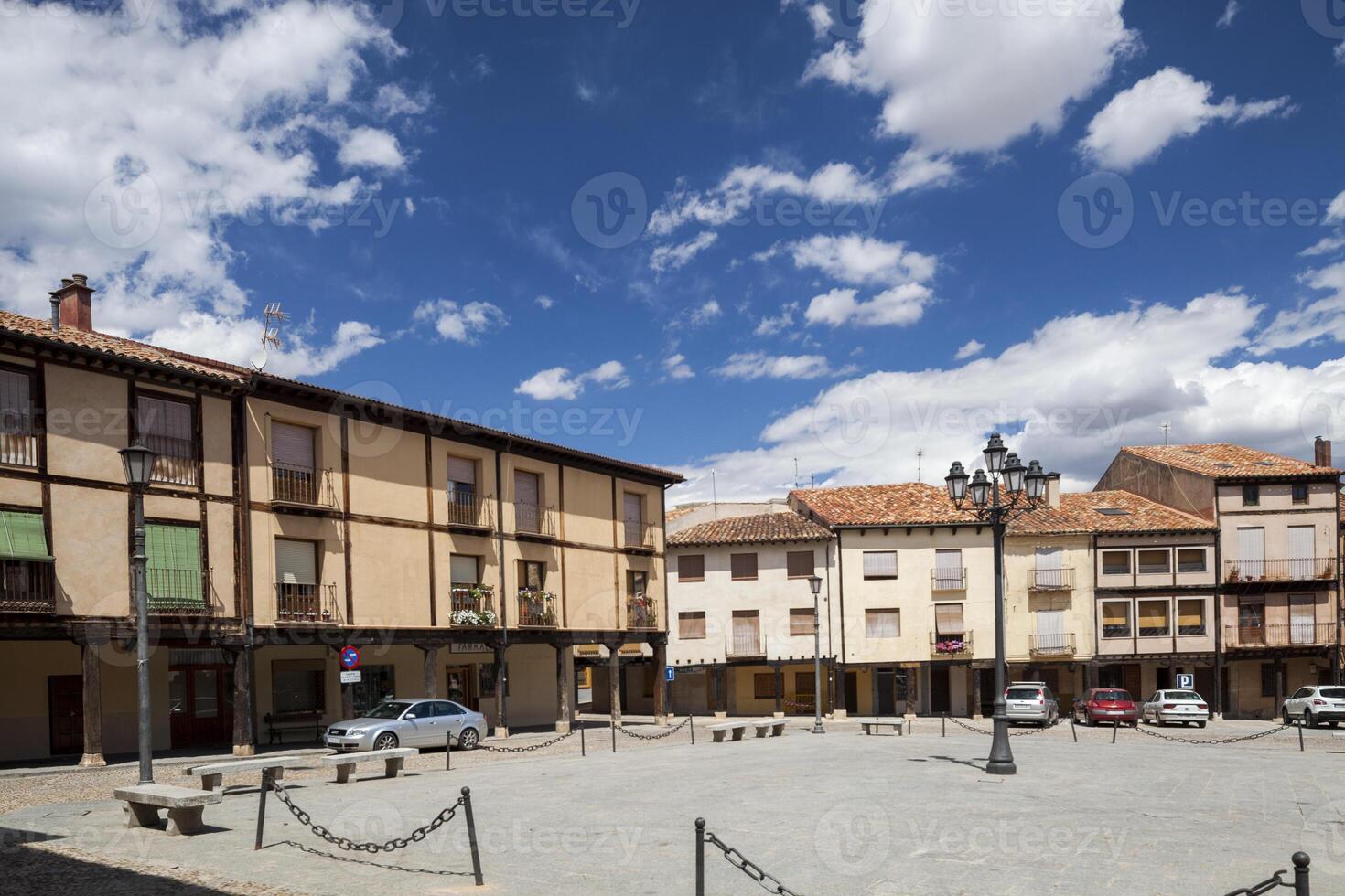 Plaza Mayor in Berlanga De Duero With Traditional Architecture and Blue Sky photo