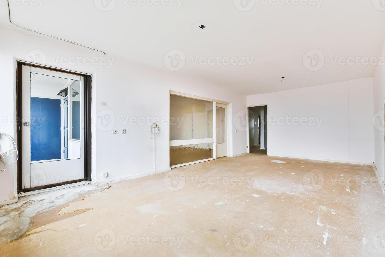 Empty room with a door and a window photo
