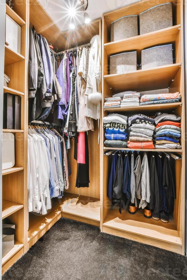 A closet with clothes and accessories photo