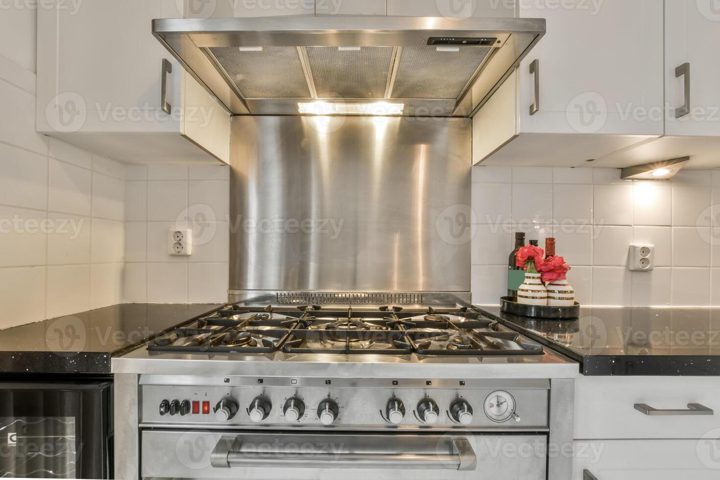 A stainless steel stove top oven photo