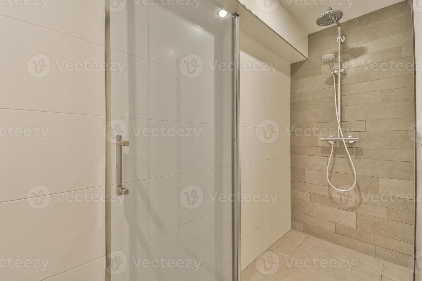 A shower with a glass door photo