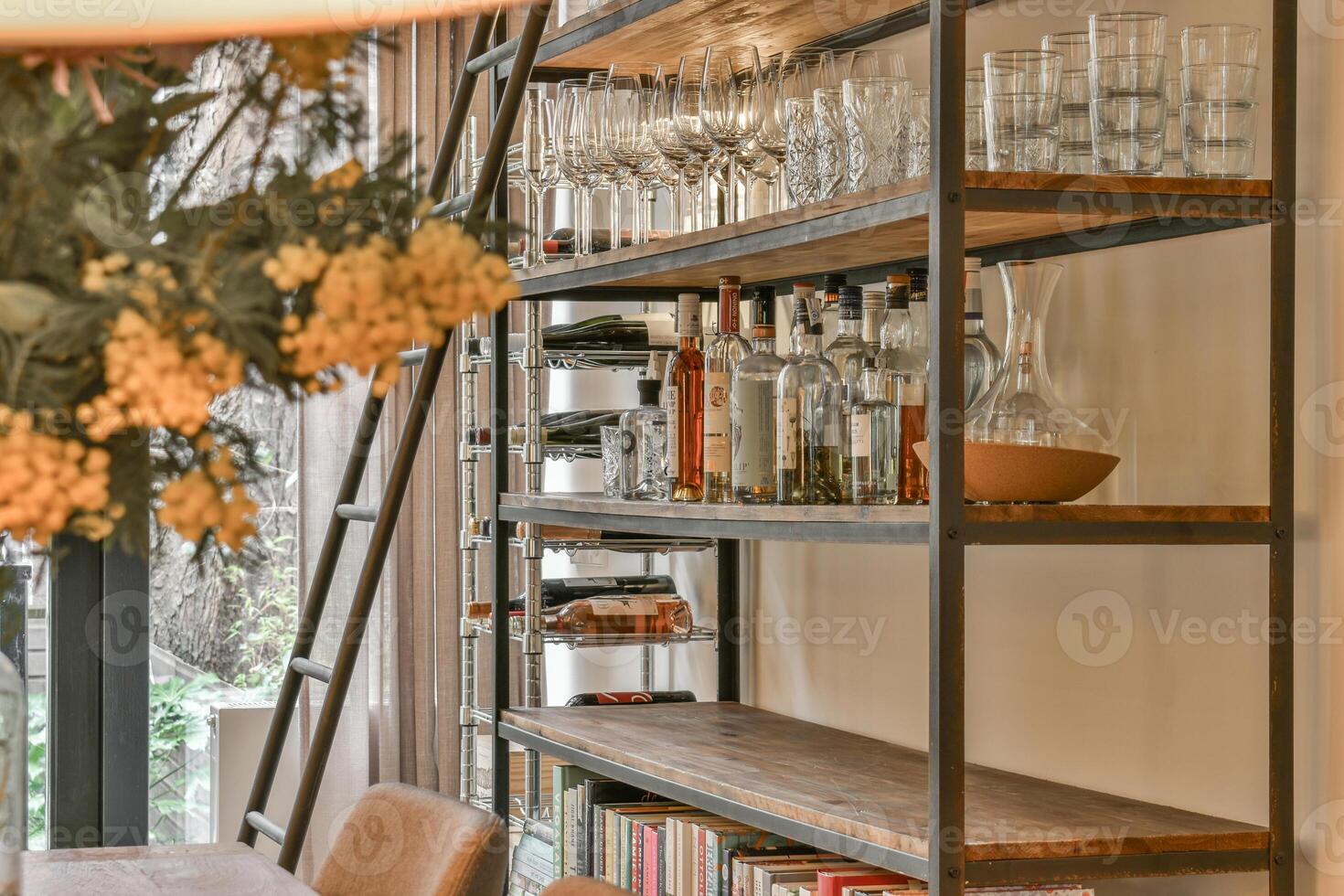 A dining room with a table and chairs photo