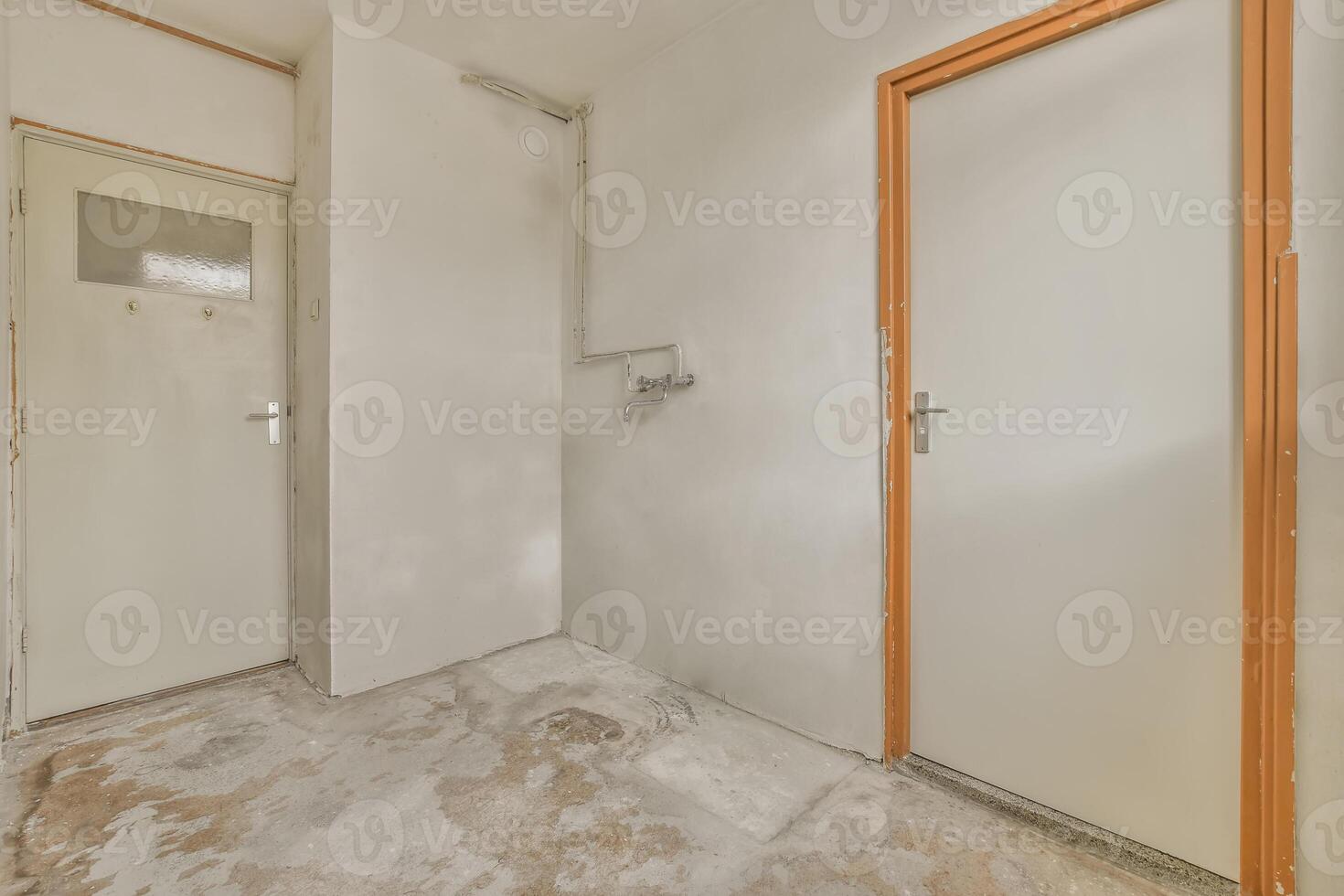 An empty bathroom with a toilet and shower photo