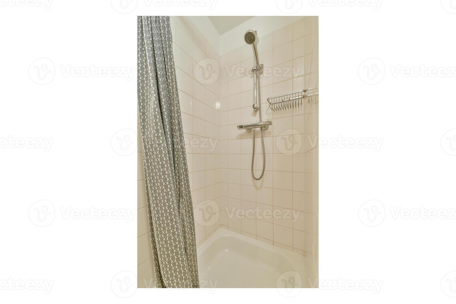 A shower with a shower head and a shower curtain photo