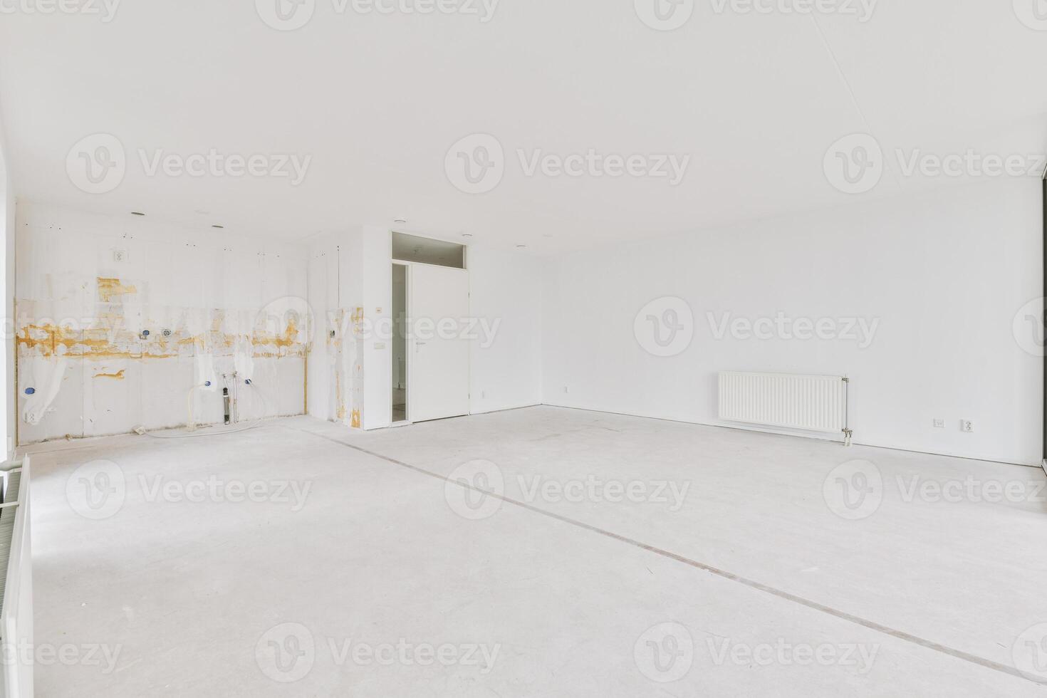 Empty room with white walls and a window photo