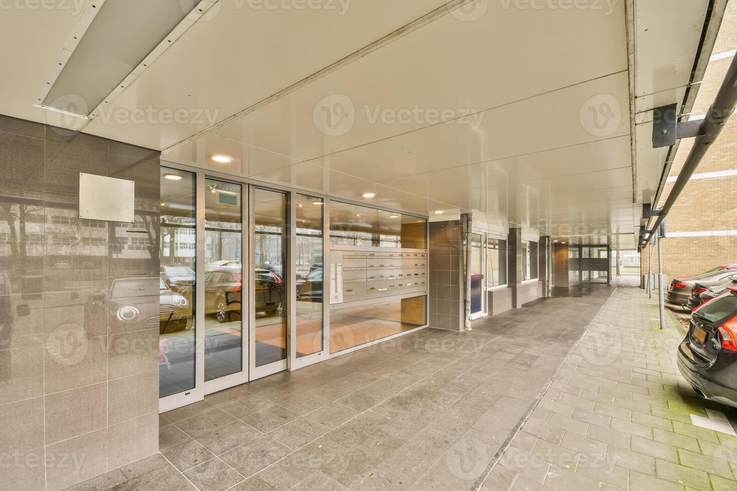 A building with a car parked in front of it photo