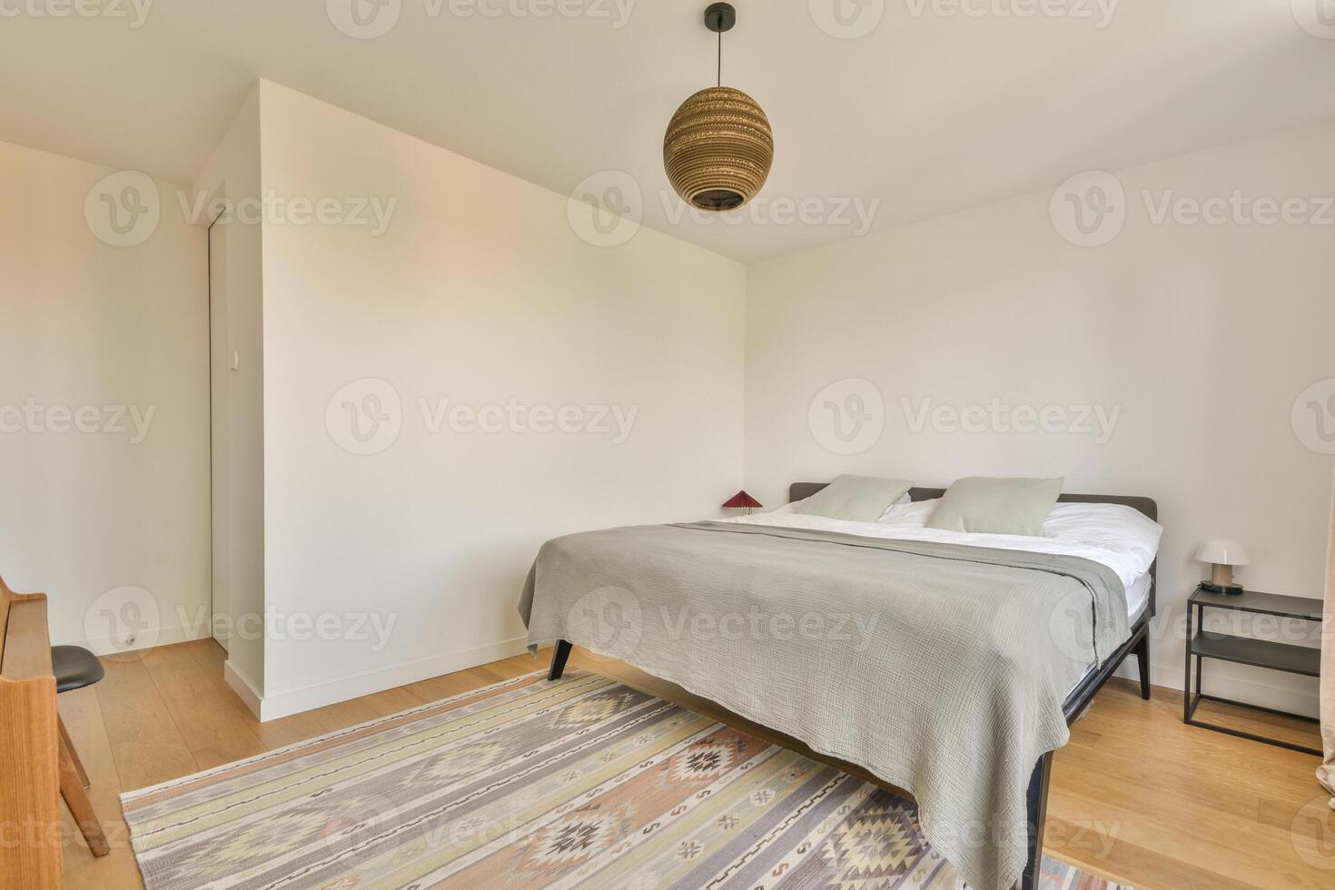 A bed in a bedroom photo