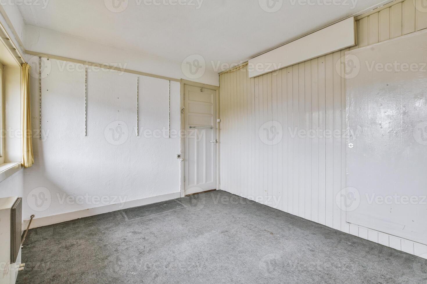 A room with a door and a window photo