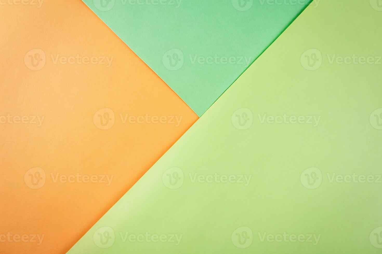 A symmetrical stock photo featuring a light green and orange pastel paper background, pastel, light green, stock photo, background, orange