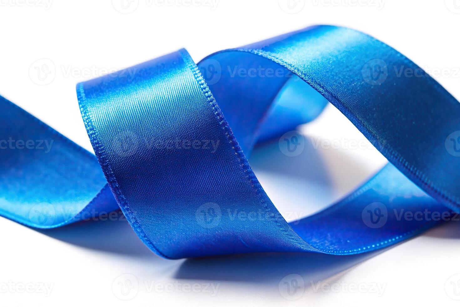 Piece of blue satin ribbon on isolated background Macro, material, close-up, soft, stylish, smooth, textile, luxury, background, pattern,blue, fashion, decoration, isolated, satin, fabric photo