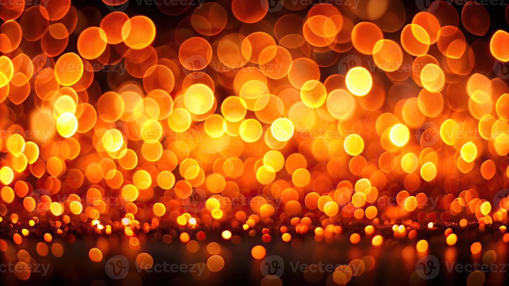 Abstract orange bokeh lights on black background at eye level photo