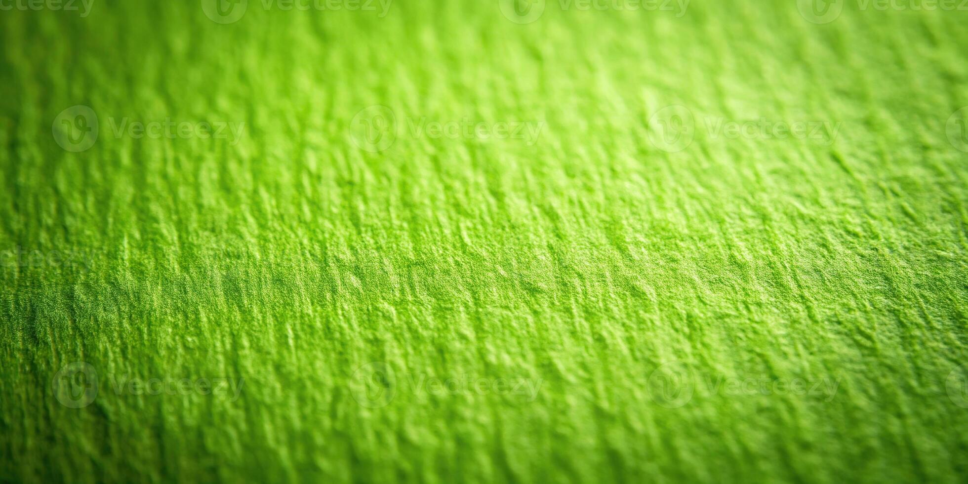Abstract green paper texture background with depth of field effect photo