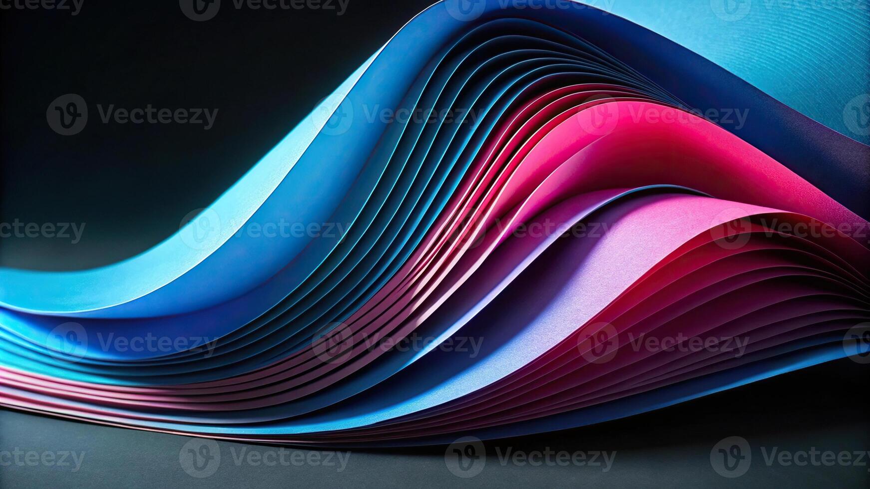 Abstract background with curvy paper sheets in blue and pink isolated on black Asymmetrical photo