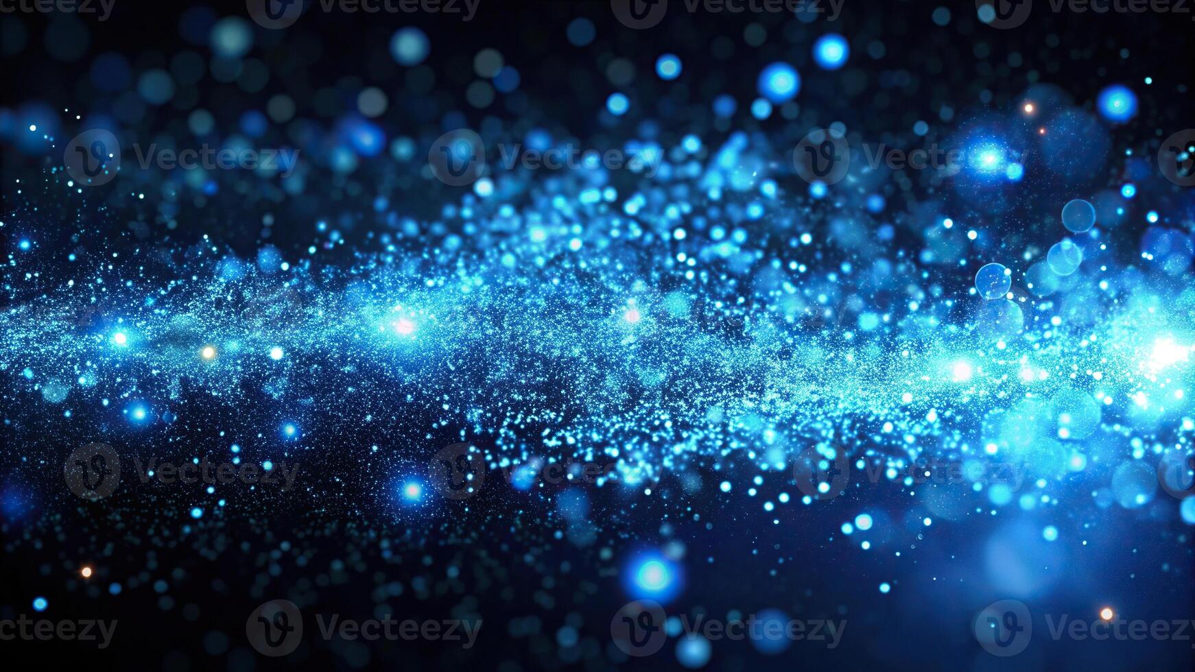 Abstract blue glowing particles background with white light and black space photo