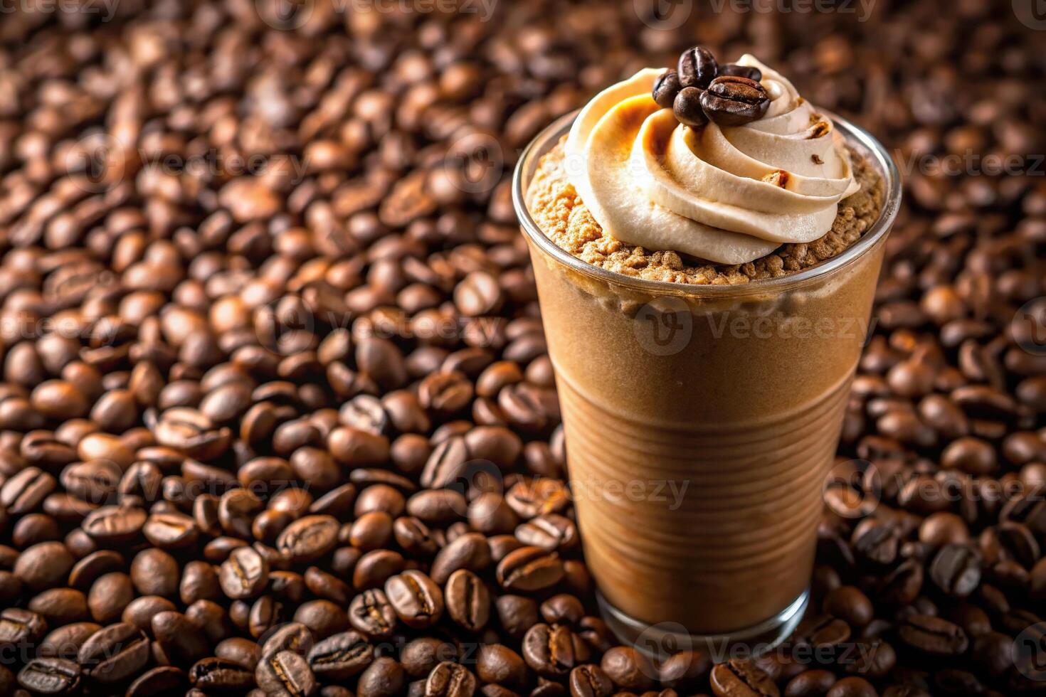 A close-up of a cup of freshly brewed frappuccino coffee with coffee beans photo