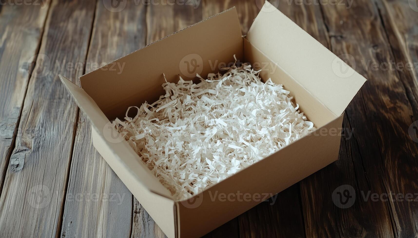 Cardboard brown box with shredded paper safety fragile product delivery shipment photo