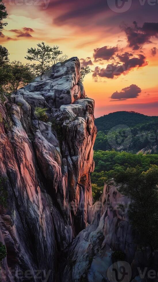 Edge rock cliff in mountain with sunset sky and cloud vertical story nature background photo