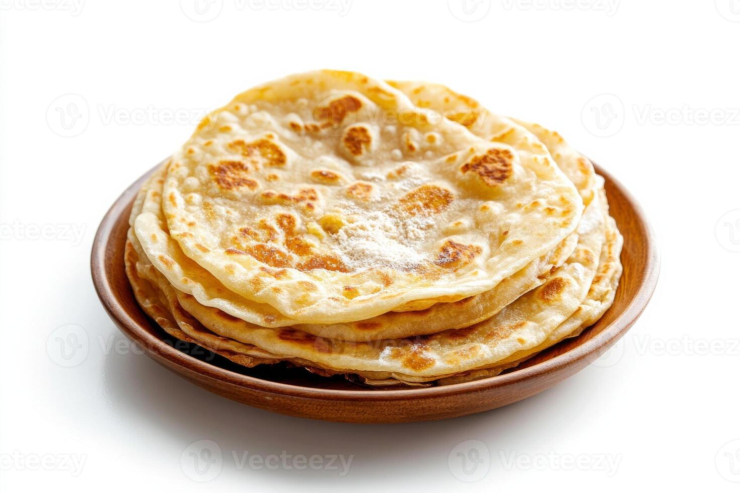 A bowl of flatbreads on a white background photo